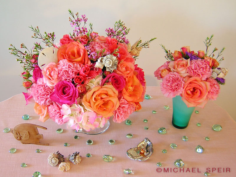 Fill your vases with a bunch of coral pink magenta and orange flowers